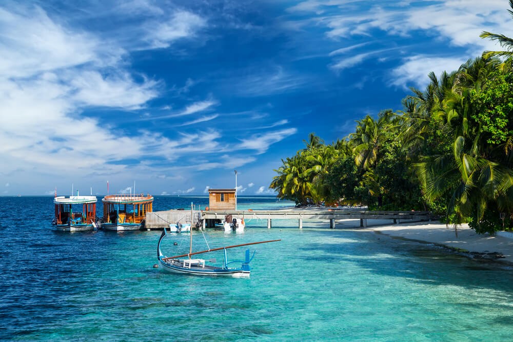 Dolphin Cruise in the Maldives: Two small fishing boats in a Maldives harbour