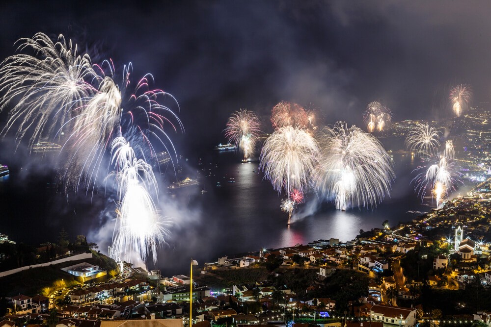 Strange New Year’s Traditions: The bay in Funchal at night with fireworks