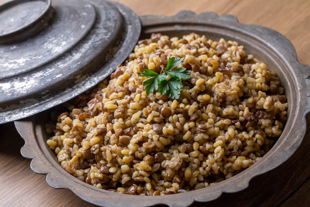 Strange New Year’s Traditions: A urn-style pot filled with a lentil dish