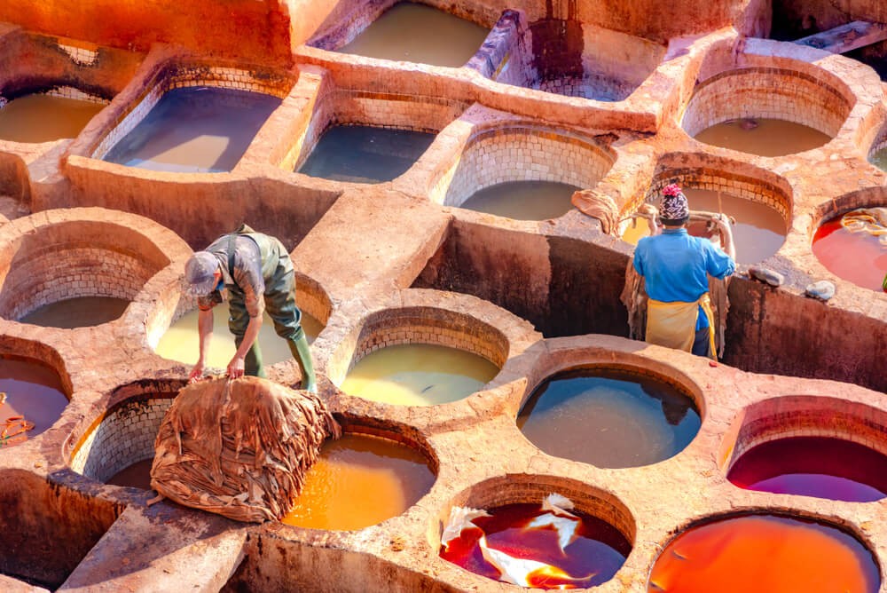 Chouara Tannery: Men working with leather at the Fez tannery