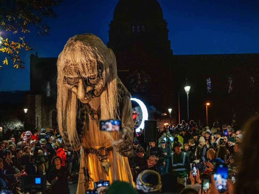 A nighttime parade celebrating Halloween in Ireland.