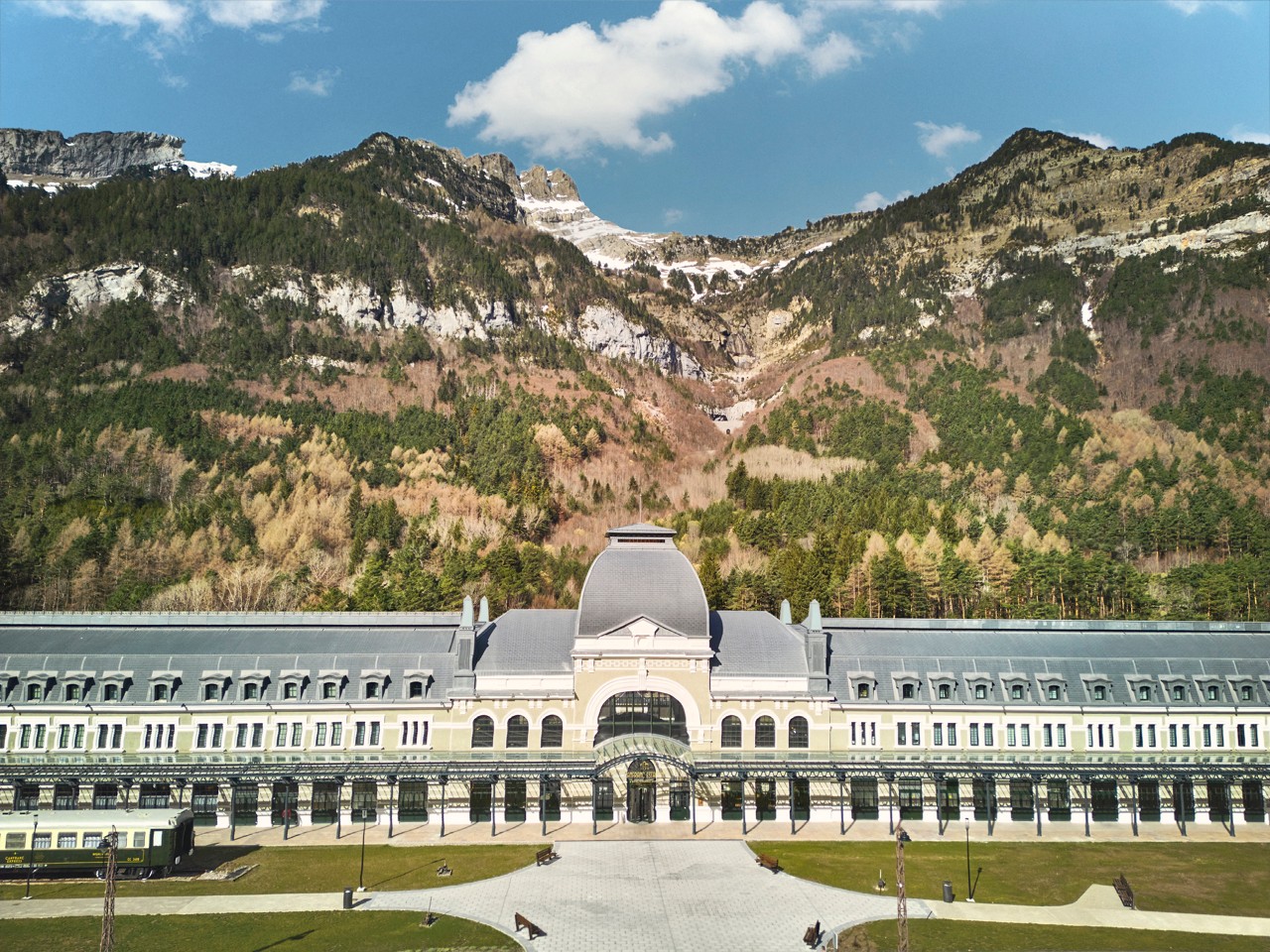 Hotel Canfranc: The green landscape of the Spanish Pyrenees with Canfranc Station