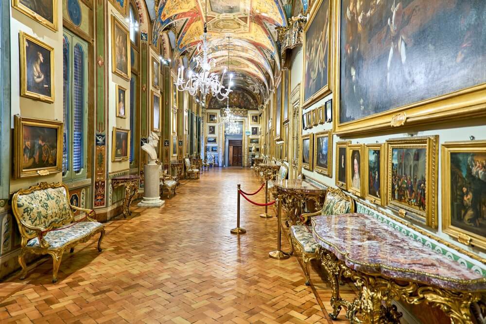 Palazzo Doria Pamphilj: The ornate gilded halls lined with paintings and furniture