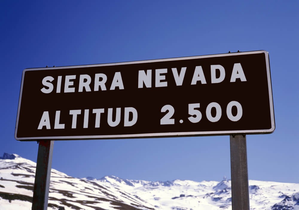 Skiing in Spain: A metal name sign of the Sierra Nevada Mountains